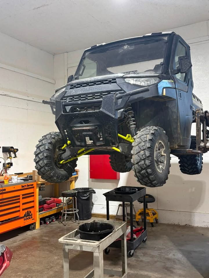 2019 Polaris Ranger raised on the lift for full service at Iowa Powersports & Outdoor